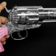 Illustration for article titled Gun Hairdryer Kills Wet Hair, Self-Respect